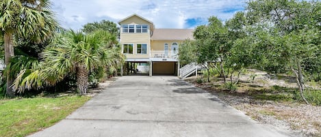 Street view of home, covered parking and large driveway for boat parking 