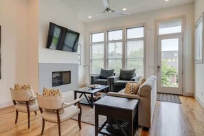Living Room: Bright, airy space with modern decor and inviting views—perfect for relaxation and fun!