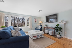 Comfortable living room with flat screen TV.