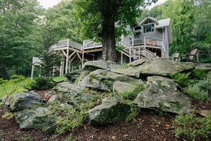 This home has natural boulder landscaping on a secluded mountain top property. 