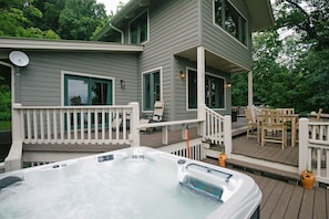 Hot tub is right outside on the deck. 