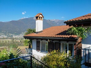 Sky, Plant, Property, Mountain, Window, Building, Azure, Blue, Wood