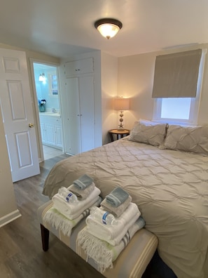 Relax in the master on a comfortable queen mattress with Beauty Rest pillows