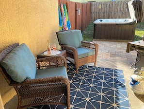 Back patio with 4 person hot tub and gas grill