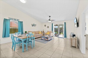 Living and dining area with Roku TV