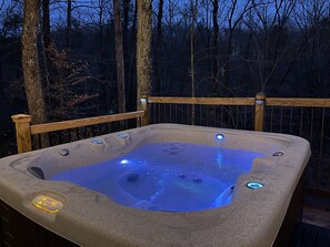 Let the warm bubbles and glowing lights melt your stress away—evenings are magical here.