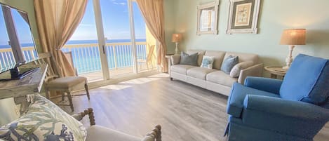 Living room with queen sleeper sofa and breathtaking gulf views