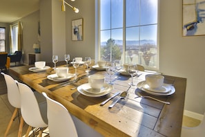The dining table can accommodate up to 8 guests