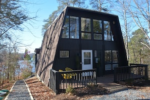 View from the front of the house. It is a flat top A frame built in 1974