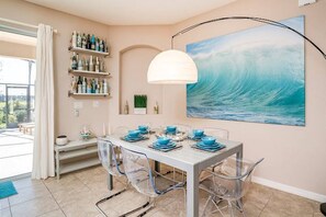 Dining Area Features Beautiful Artwork and Décor
