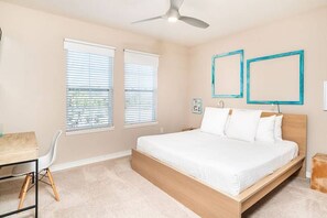 Second Floor King Bedroom w/En-Suite Features a Platform Bed, Flat Screen TV, Desk Area