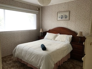 Master bedroom, double bed.