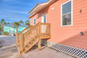 Unit 7022 - This unit offers stairs at the main entry door or you can also access the cottage through the screened porch.