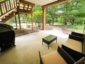 Lower level deck - Seating on this level with a gas grill