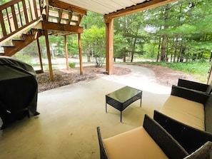 Lower level deck - Seating on this level with a gas grill
