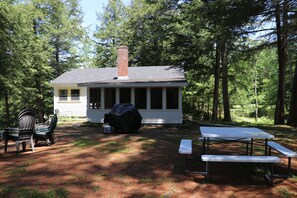 Yard with picnic table.
