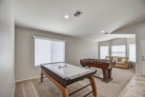 Spacious Game room - air hockey table/foosball table and full-size sleeper sofa 