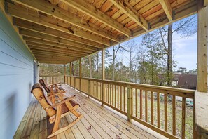 The first floor porch is located off of the master bedroom.