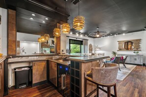 Lower Level Family Room with large tv and bar!