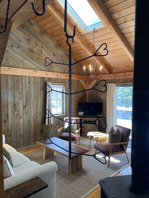 Dry your ski gear on the hooks near the warm wood stove.