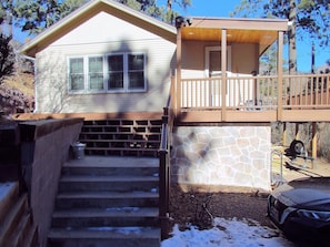 Stairway access is adjacent to private off-street parking.