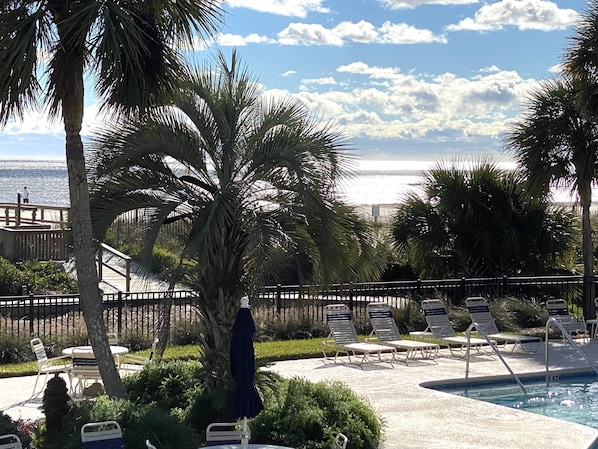 View from 3B Seagrove overlooking pool and beach