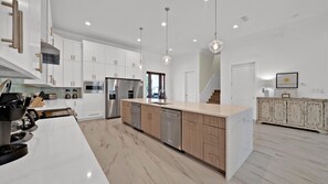 This Magnificent Kitchen has Two of Everything! Two Ovens, Two Refrigerators, Two Coffee Pots, and Two Dishwashers!