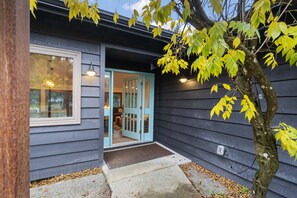 The Cerulean door leads you into bright open cozy space for relaxation.  