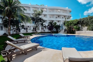 Step out from the terrace to the pool and lounge area. Beach towels supplied.