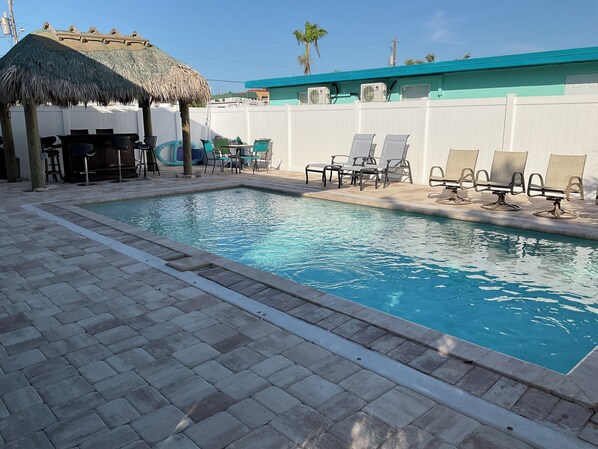 Pool with Sun Ledge and Tiki Bar