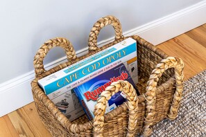 Enjoy Cape Cod themed Monopoly and Rummibub, or read through a Chatham magazine.