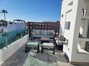 Balcony with outdoor sitting.