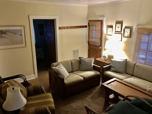 Living Room w/door to Bdrm 1.
