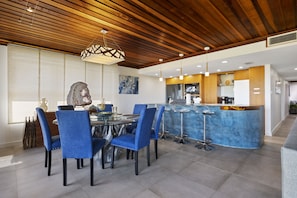 Gorgeous open concept kitchen and dining area! Kitchen is fully stocked.