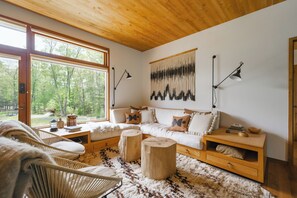 Curl up with a book or watch your favorite show in the cozy living area