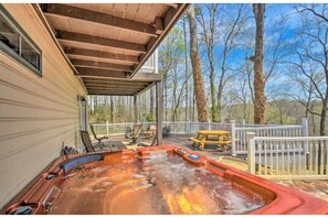 Private hot tub on back deck overlooking woods 
