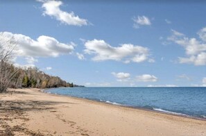 Shallow, swimmable lake.  Miles of walkable sandy beach.