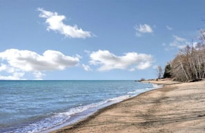 Shallow, swimmable lake.  Miles of walkable sandy beach.