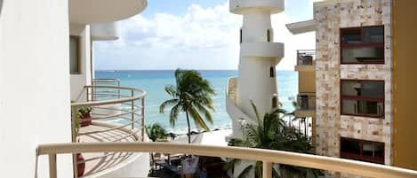 Bedrooms feature private ocean-view terraces