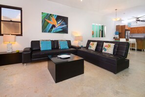Our living space perfectly combines coastal elegance with comfortable seating - So take full advantage and spend your downtime here however you so wish.