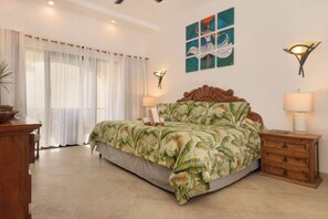 Plush king-sized bed and wall-to-wall windows for the perfect escape