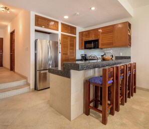 Fully equipped kitchen with granite countertops and all essentials