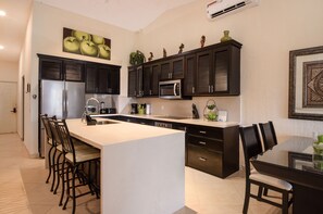 Find style and convenience in our pristine, fully functional kitchen space, weather you're creating your own cuisine or simply need of utensils for local takeout!
