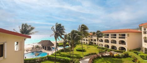 Welcome to our oceanfront retreat! Savor each day of tropical Caribbean views, right from our sparkling community pool.