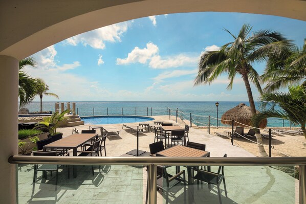 Step outside each morning to be greeted by never-ending views of the Caribbean Sea!