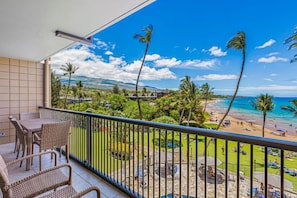 Outdoor dining with a gorgeous view from the lanai