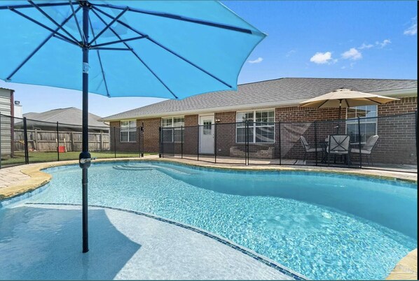 Rock Bottom: Relax by the pool & have a drink by the pool