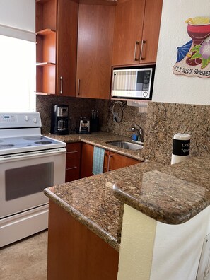 Fully equipped kitchen w/full size appliances. 