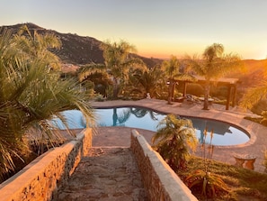 view of pool from house
