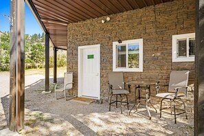 Entrance and outdoor seating area to Studio on 1st floor of house. 